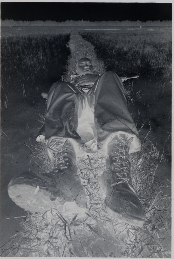 Untitled (Soldier Lounging In Rice Field, Vietnam)