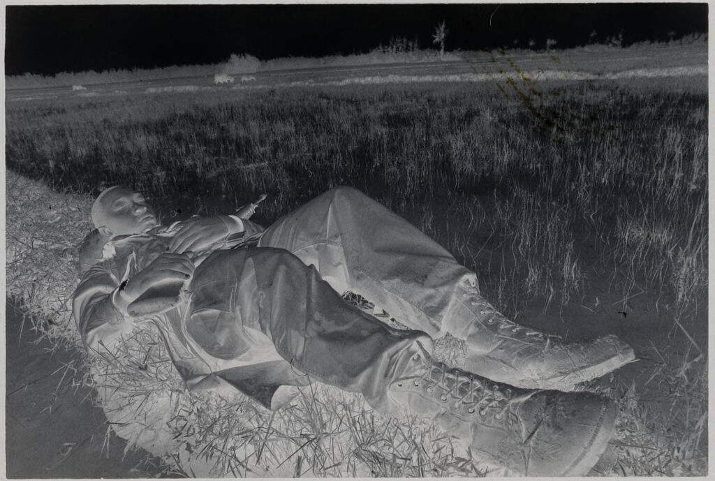 Untitled (Soldier Lounging In Rice Field, Vietnam)