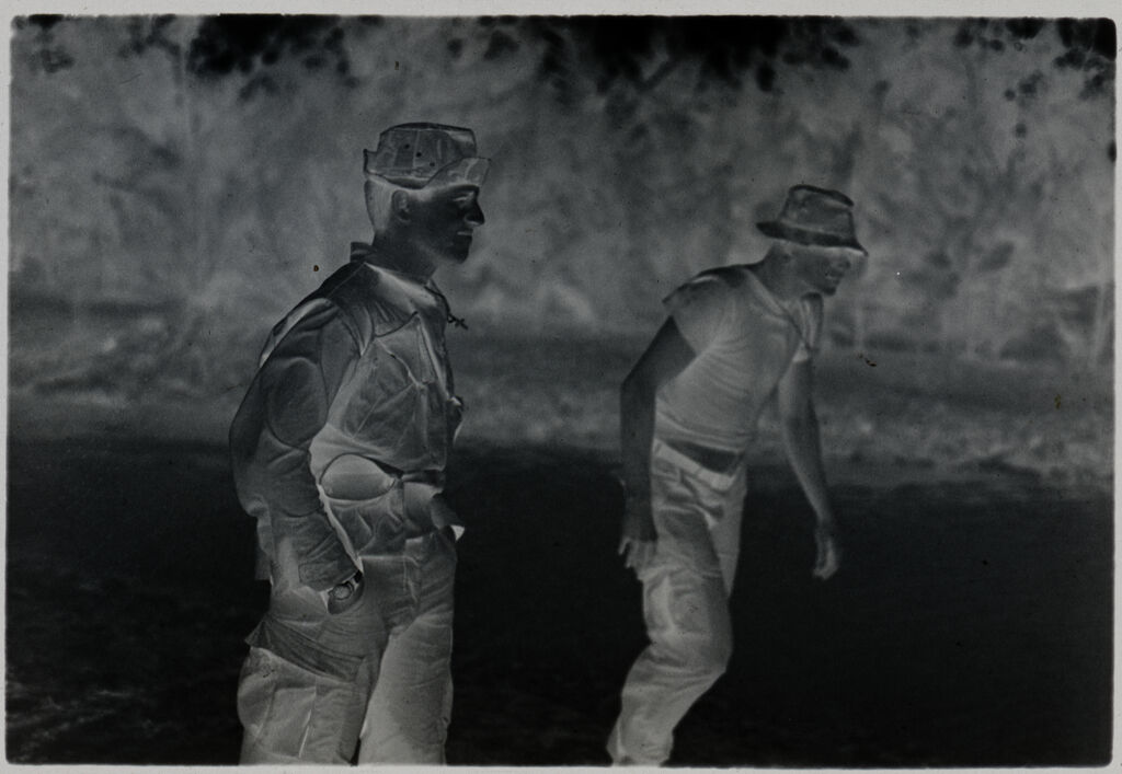 Untitled (Two Soldiers Wading Through Water, Vietnam)