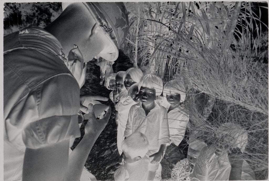 Untitled (Soldier Talking With Group Of Children, Vietnam)