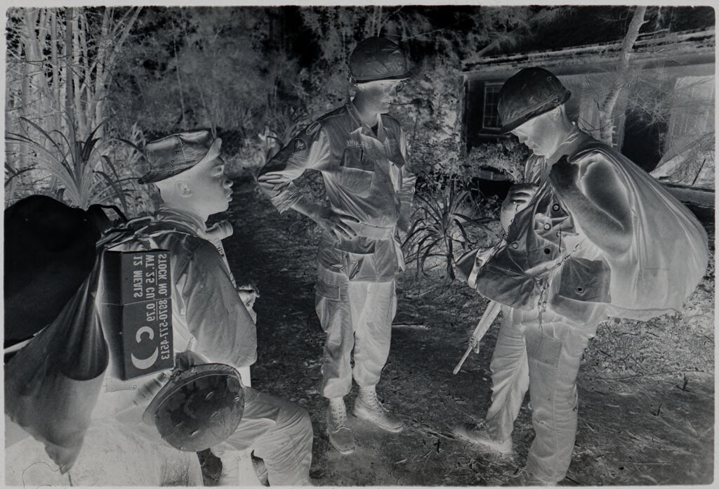 Untitled (Soldiers Stopped On Path In Front Of House, Vietnam)