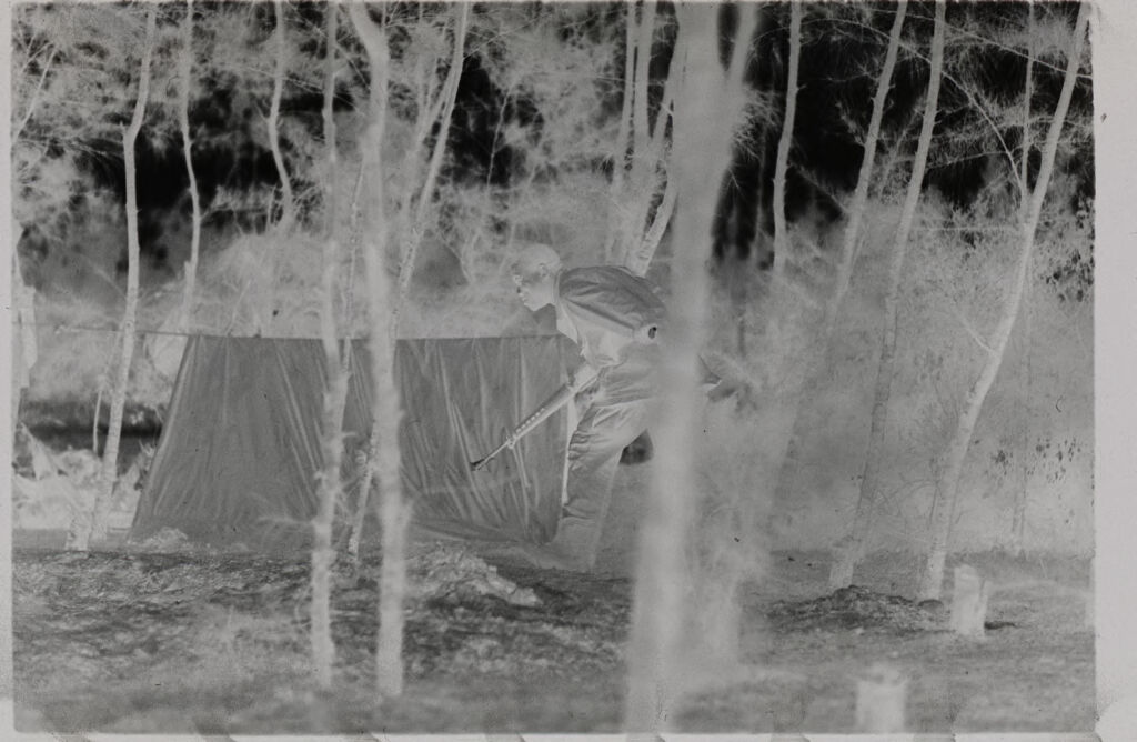 Untitled (Soldier In Combat Fatigues By Campsite, Vietnam)