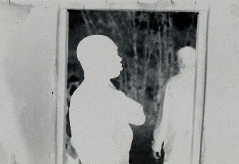 Untitled (Soldiers Silhouetted In Doorway, Vietnam)