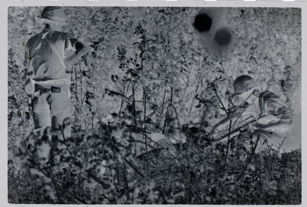 Untitled (Soldiers Standing Outside Building, Photographed From Inside Through Barred Window, Vietnam)