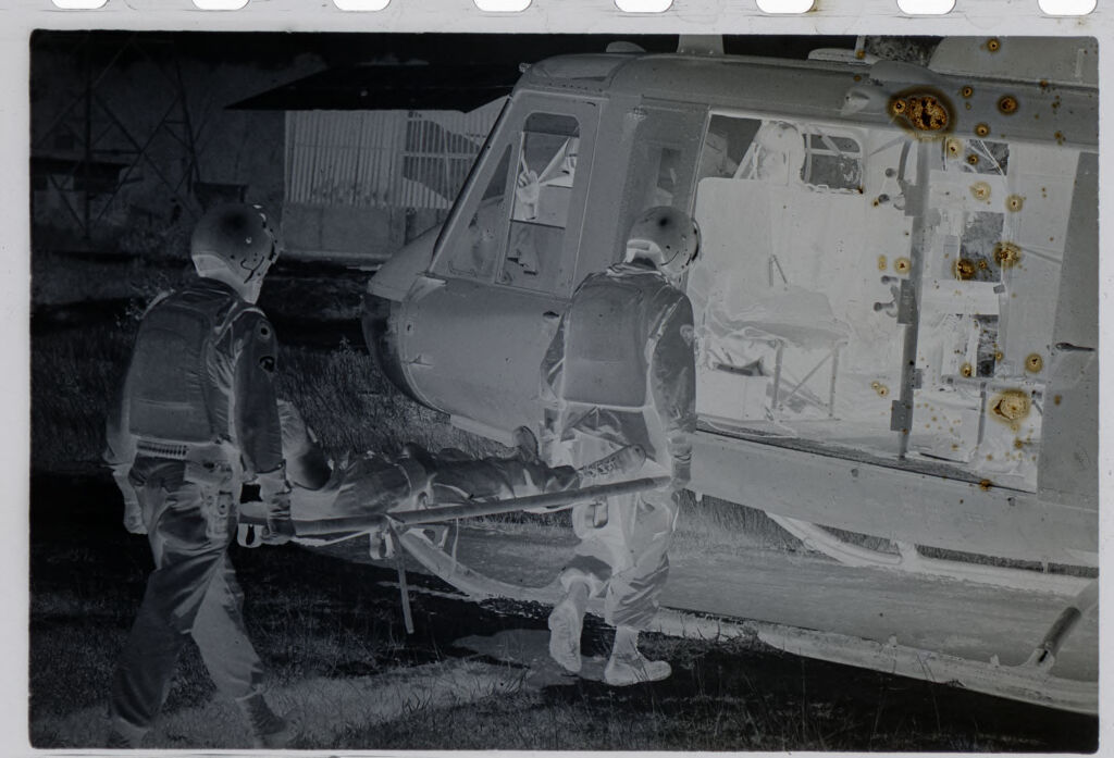 Untitled (Loading Wounded Solider Into Medevac Helicopter, Vietnam)