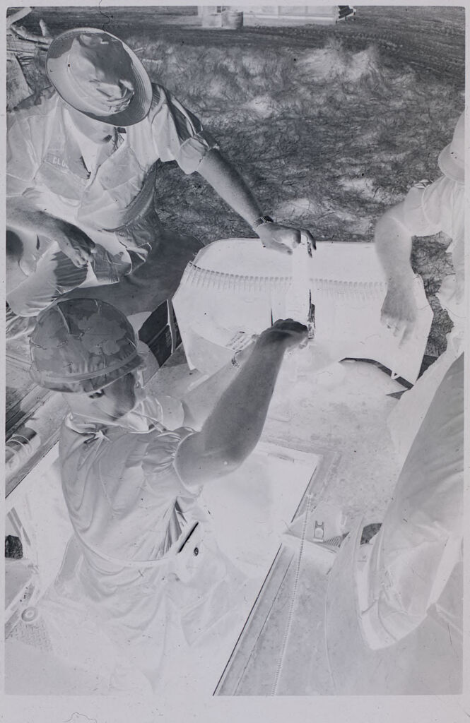 Untitled (Soldiers Checking Ammunition And Equipment, Vietnam)
