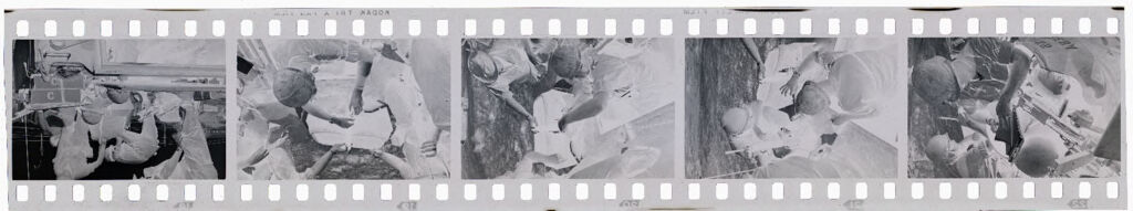 Untitled (Soldiers Checking Ammunition And Equipment, Vietnam)