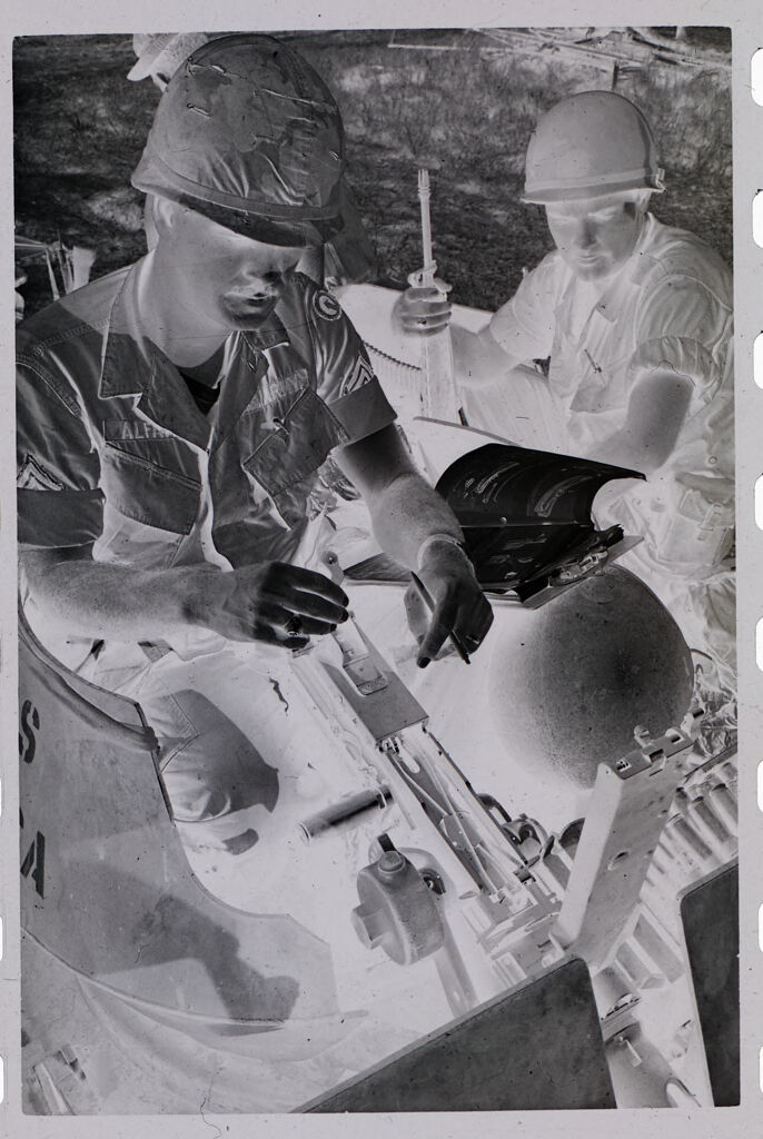 Untitled (Soldiers Trading Supplies And Tags, Vietnam)