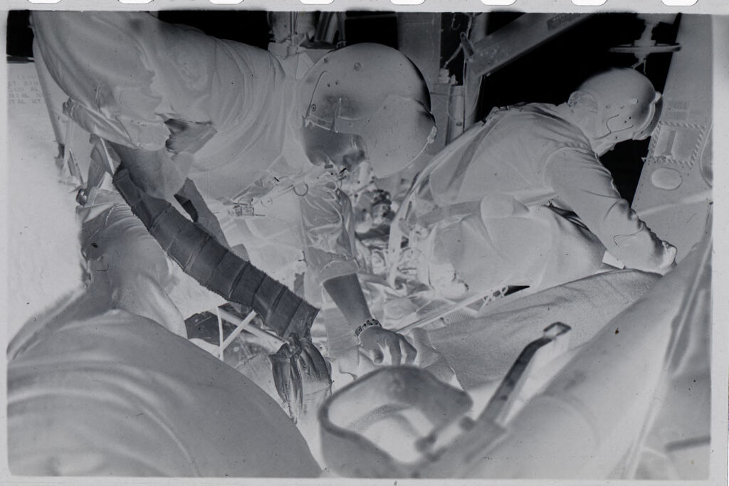 Untitled (Medics Treating Wounded Inside Helicopter, Vietnam)