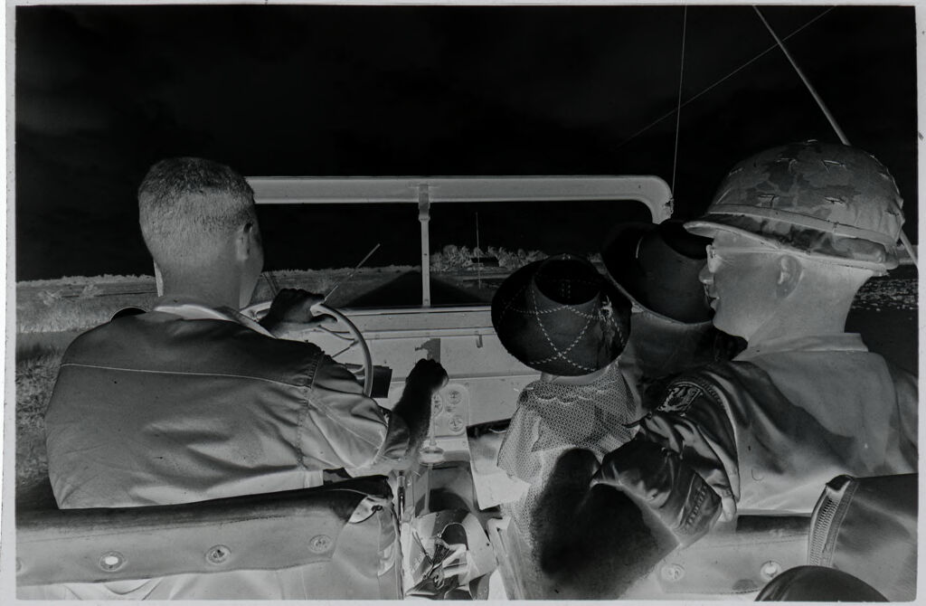 Untitled (Soldiers And Vietnamese Woman Riding In Jeep, Vietnam)