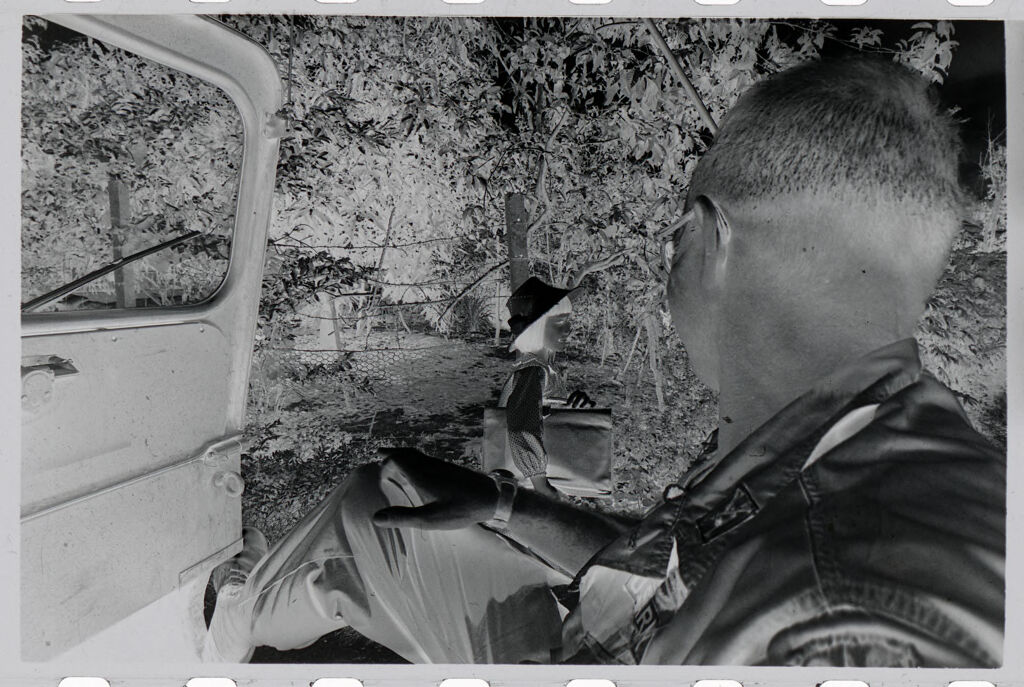 Untitled (Soldiers And Vietnamese Woman Riding In Jeep, Vietnam)