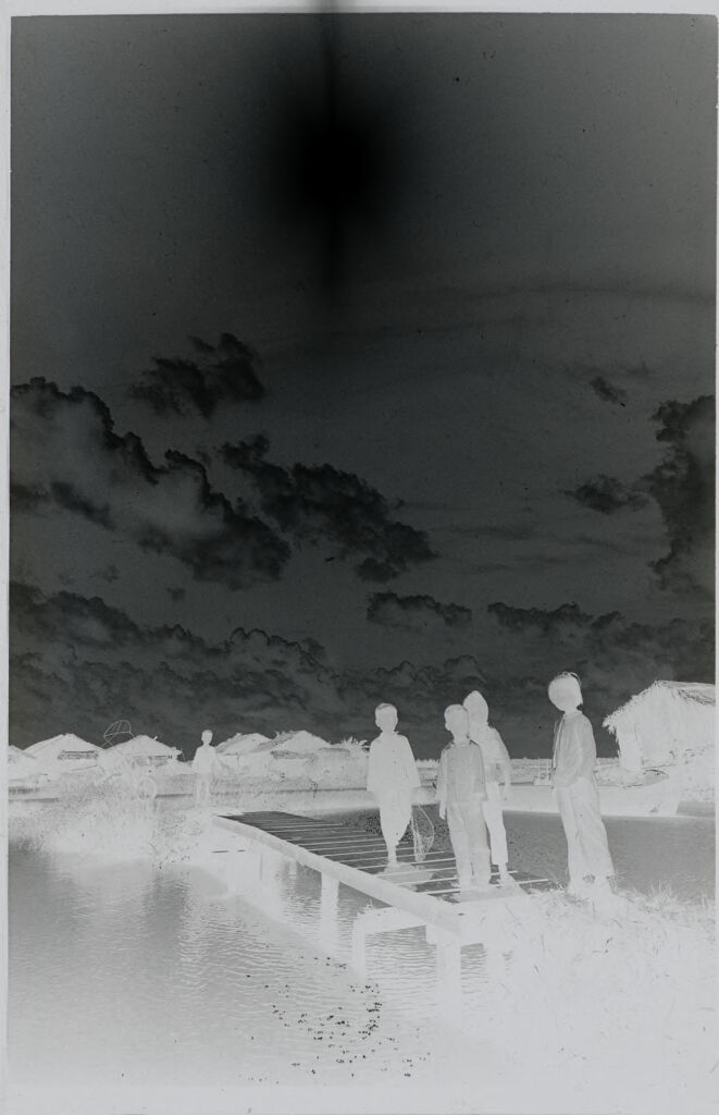 Untitled (Group Of Children Standing On A Dock, Vietnam)
