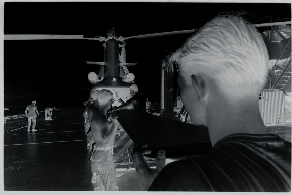 Untitled (Soldiers Working On Helicopter, Vietnam)