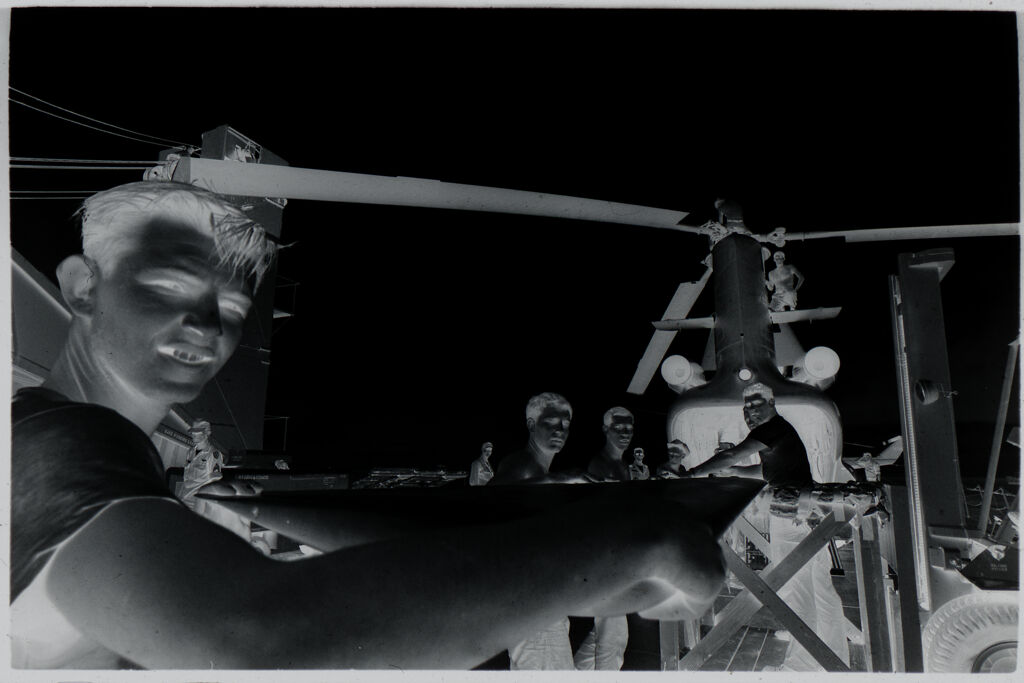 Untitled (Soldiers Working On Helicopter, Vietnam)