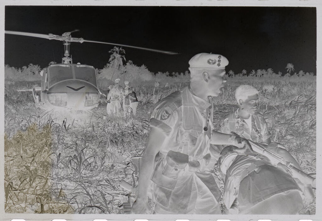 Untitled (Soldiers Near Helicopter In Rice Paddy, Vietnam)