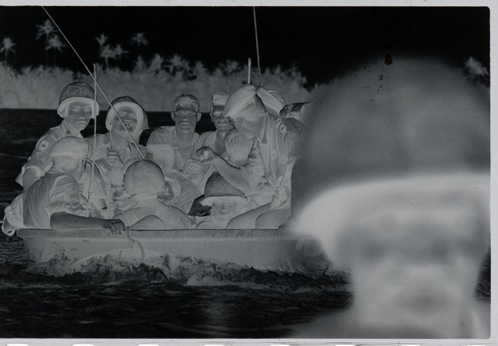 Untitled (Soldiers In Small Boat Crossing Water, Vietnam)