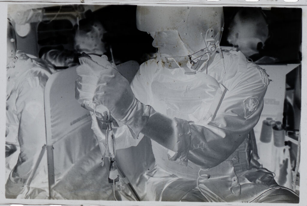 Untitled (Soldier Holding Plasma Bag Inside Medevac Helicopter, Vietnam)