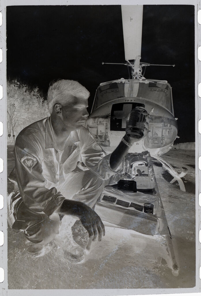 Untitled (Soldier With Supplies And Stretcher In Front Of Medevac Helicopter, Vietnam)