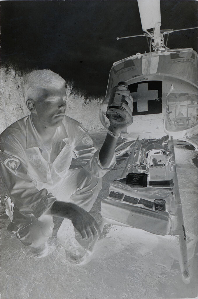 Untitled (Soldier With Supplies And Stretcher In Front Of Medevac Helicopter, Vietnam)