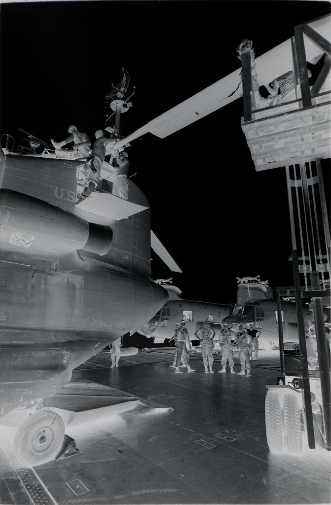 Untitled (Soldiers Working On Rotor Of Chinook Helicopter, Vietnam)
