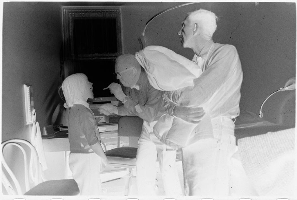 Untitled (Dr. Herman M. Juergens Examining Young Patient With Father Present)